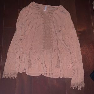 pink long sleeve top with v neck with tassels!